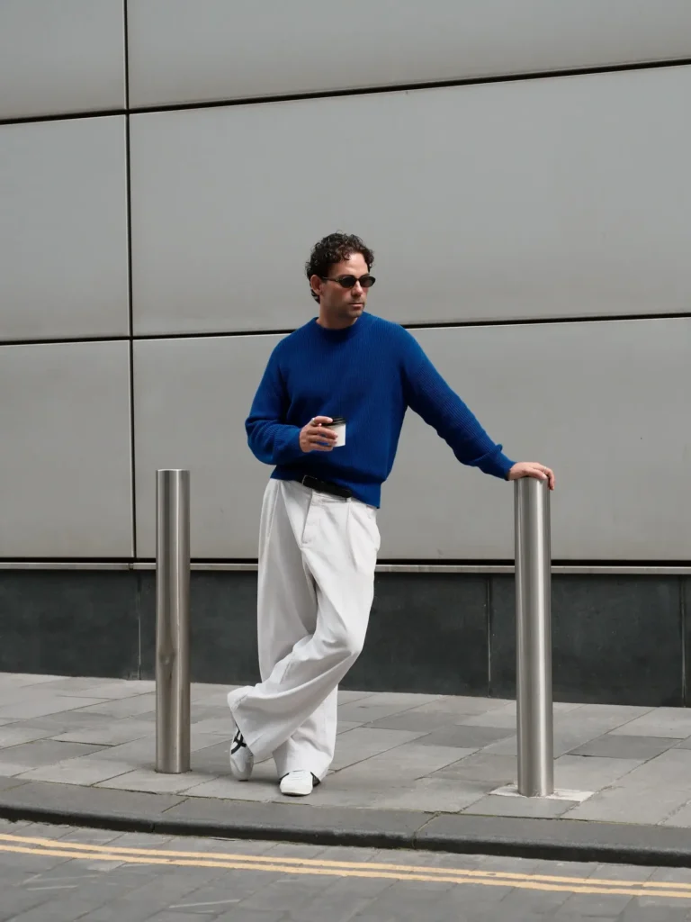 14 Men Casual Winter Outfits Ideas for Everyday Style 7 a guy wearing Electric Cobalt Knit with Off-White Chinos