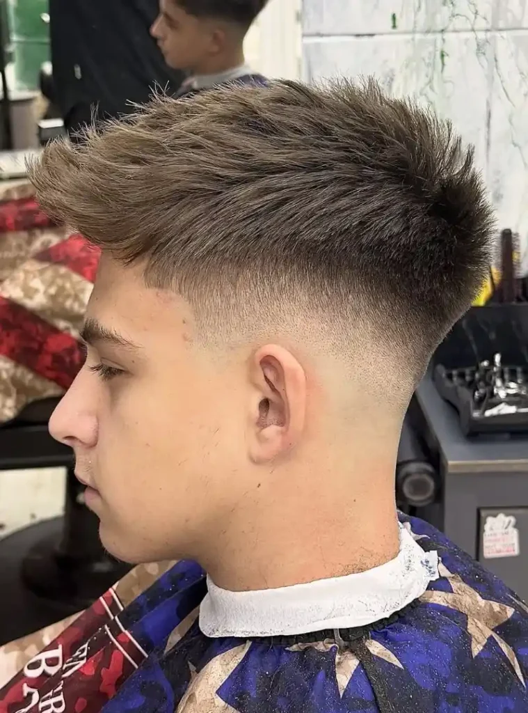 19 Skin Fade Hair Styles Men Can Try for a Clean, Modern Cut 20 a Spiky Top and Mid Skin Fade