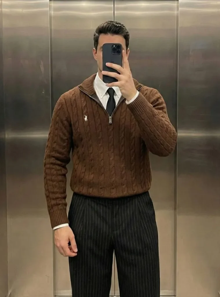 12 Smart Fall Business Casual Outfit Ideas to Look Sharp 9 a man posing in a Brown Quarter-Zip Cable Knit Over a Collared Shirt and Tie