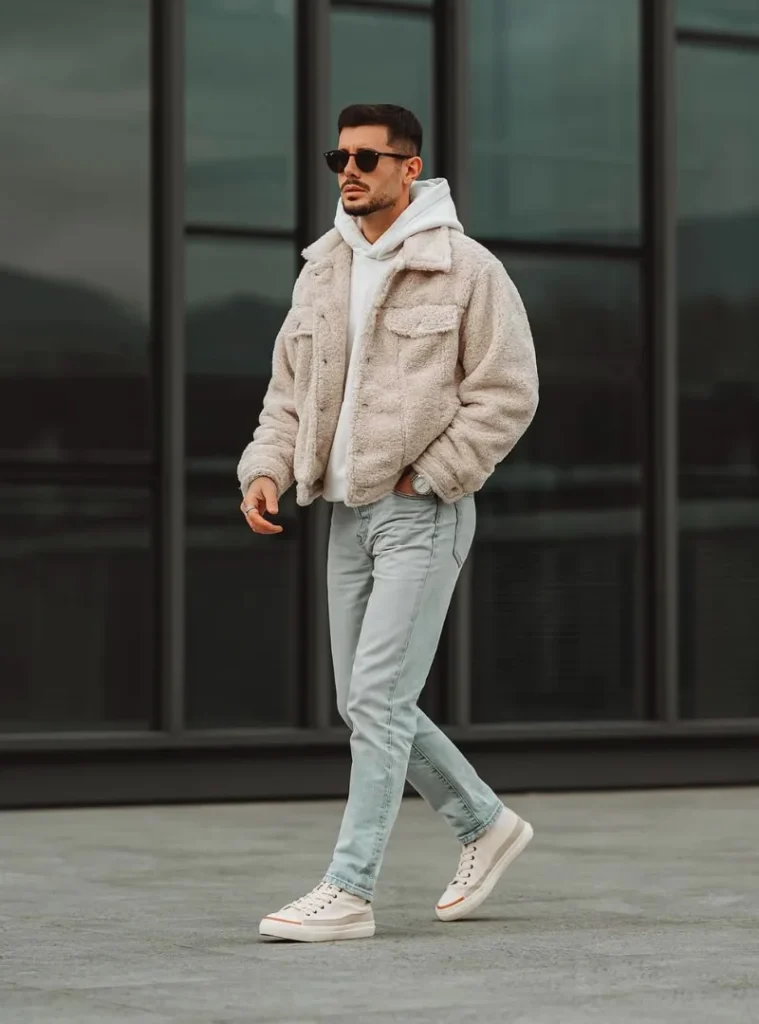 14 Men Casual Winter Outfits Ideas for Everyday Style 14 a guy wearing Cropped Teddy Fleece Jacket with Faded Light Denim