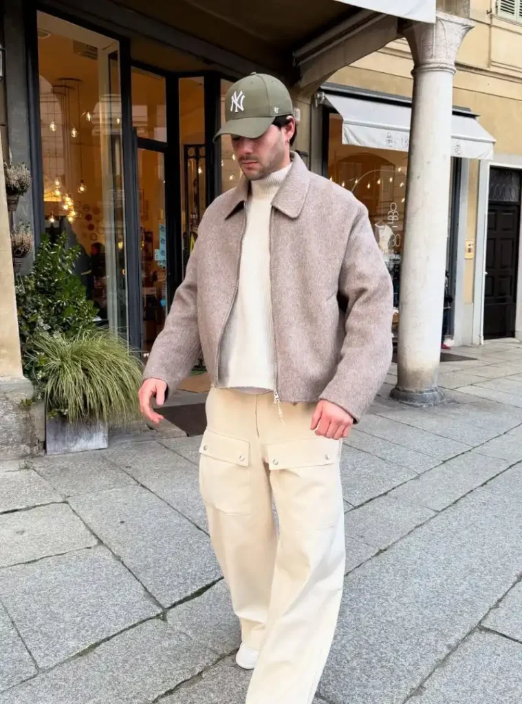 22 Fall Jackets Outfit Ideas for Men to Layer Up in Style 20 a man with a Soft Taupe Wool Blouson over Cream Cargos