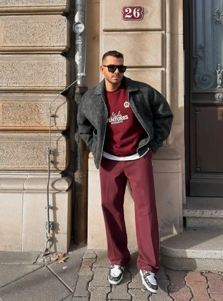 14 Men Casual Winter Outfits Ideas for Everyday Style 15 a man wearing Charcoal Textured Zip Blouson with Burgundy Matching Set