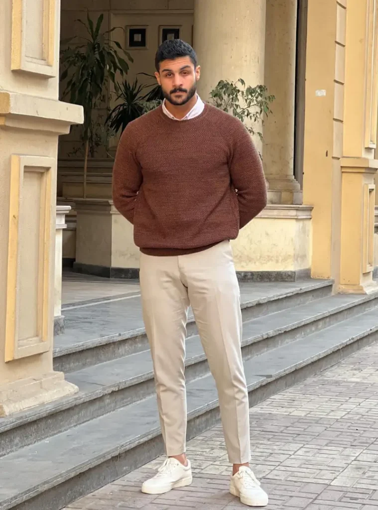 20 Easy Ideas for Fall Casual Outfits Men Can Rely On 4 a guy with Rust Textured Sweater Over a Crisp White Collar