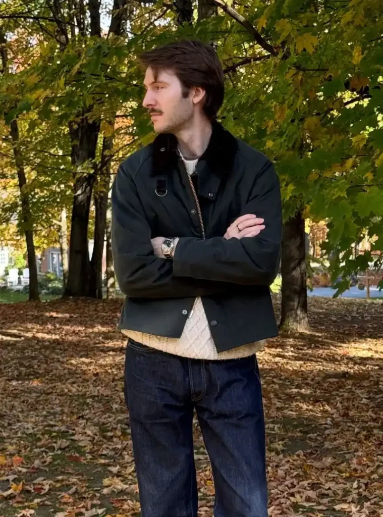 22 Fall Jackets Outfit Ideas for Men to Layer Up in Style 22 a man wearing a Cropped Waxed Canvas Jacket Over a Chunky Cable Knit